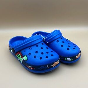 Blue kids slip on shoes with Dinosaurs along the bottom size 28
